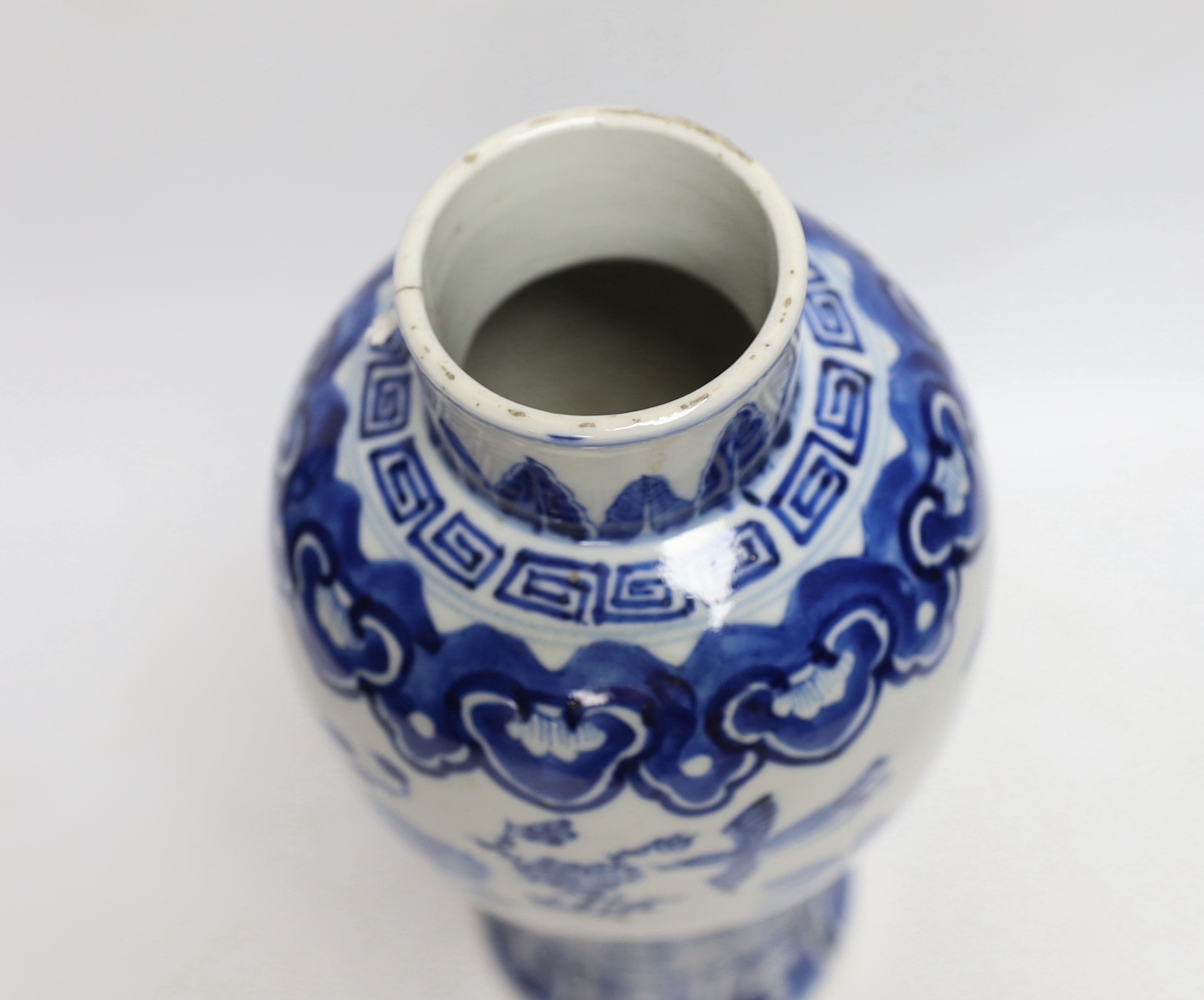 A Chinese blue and white baluster 'blackbirds amid blossom' vase, Kangxi mark, but late 19th century, 27cm